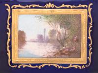 A Sèvres Style Painted and Parcel Gilt Porcelain Table Casket