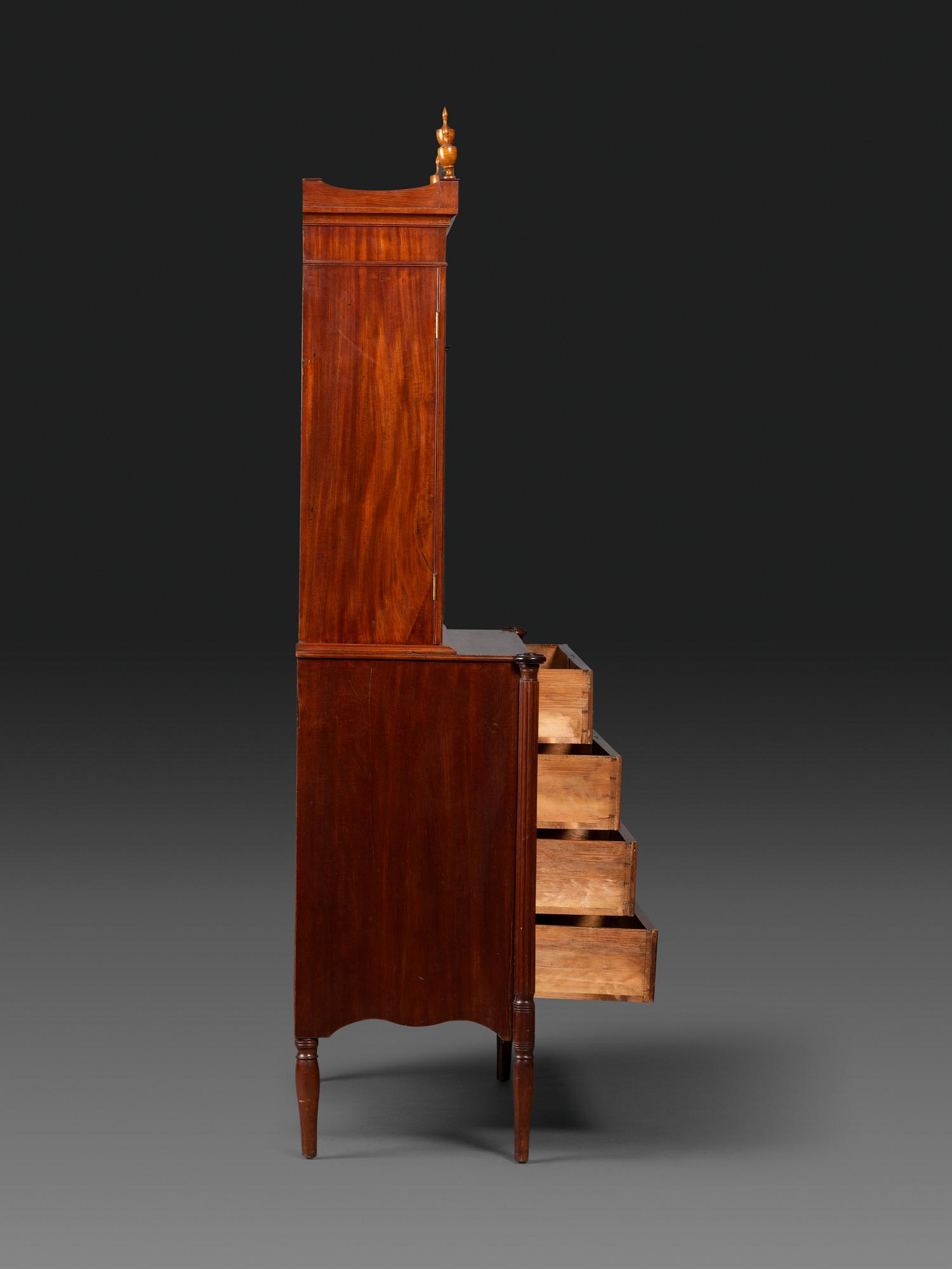 A Federal Mahogany and Figured Maple Secretary Bookcase