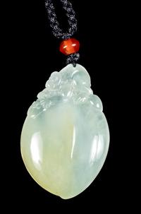A Jadeite Peach-Form Pendant Length 1 1/2 inches. — 20TH CENTURY