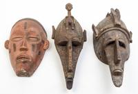 A Collection of Eleven Masks Height of first 20 inches.