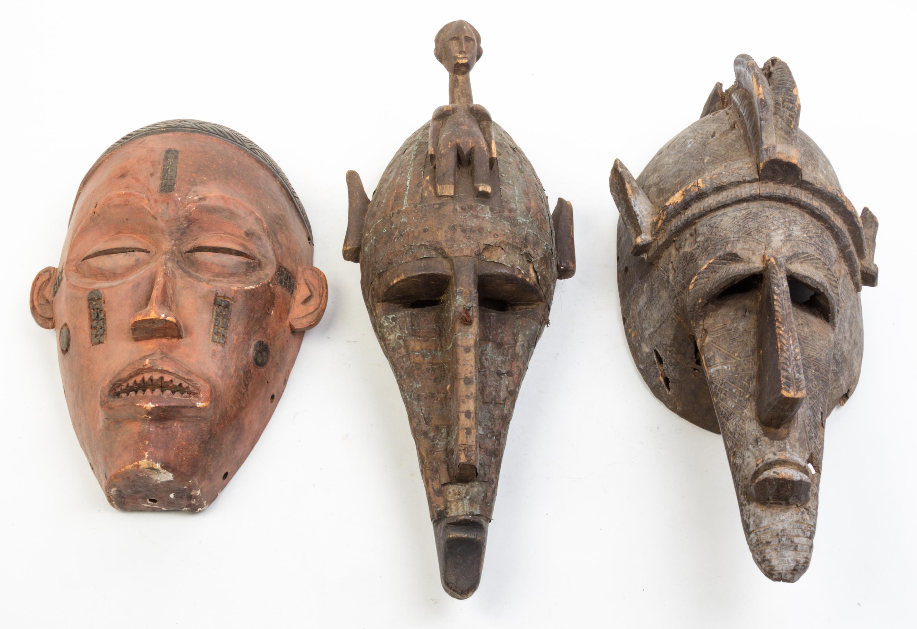A Collection of Eleven Masks Height of first 20 inches.