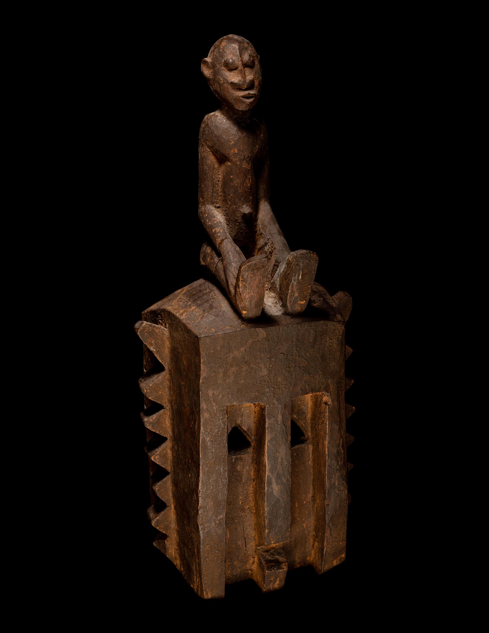 Two Dogon Wood Masks with Figures