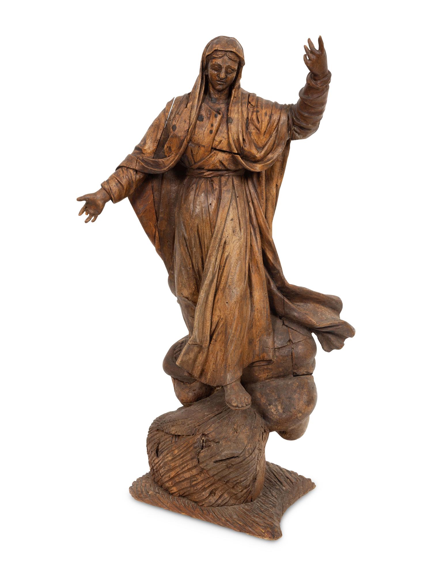 A Continental Carved Pine Figure of Female Saint