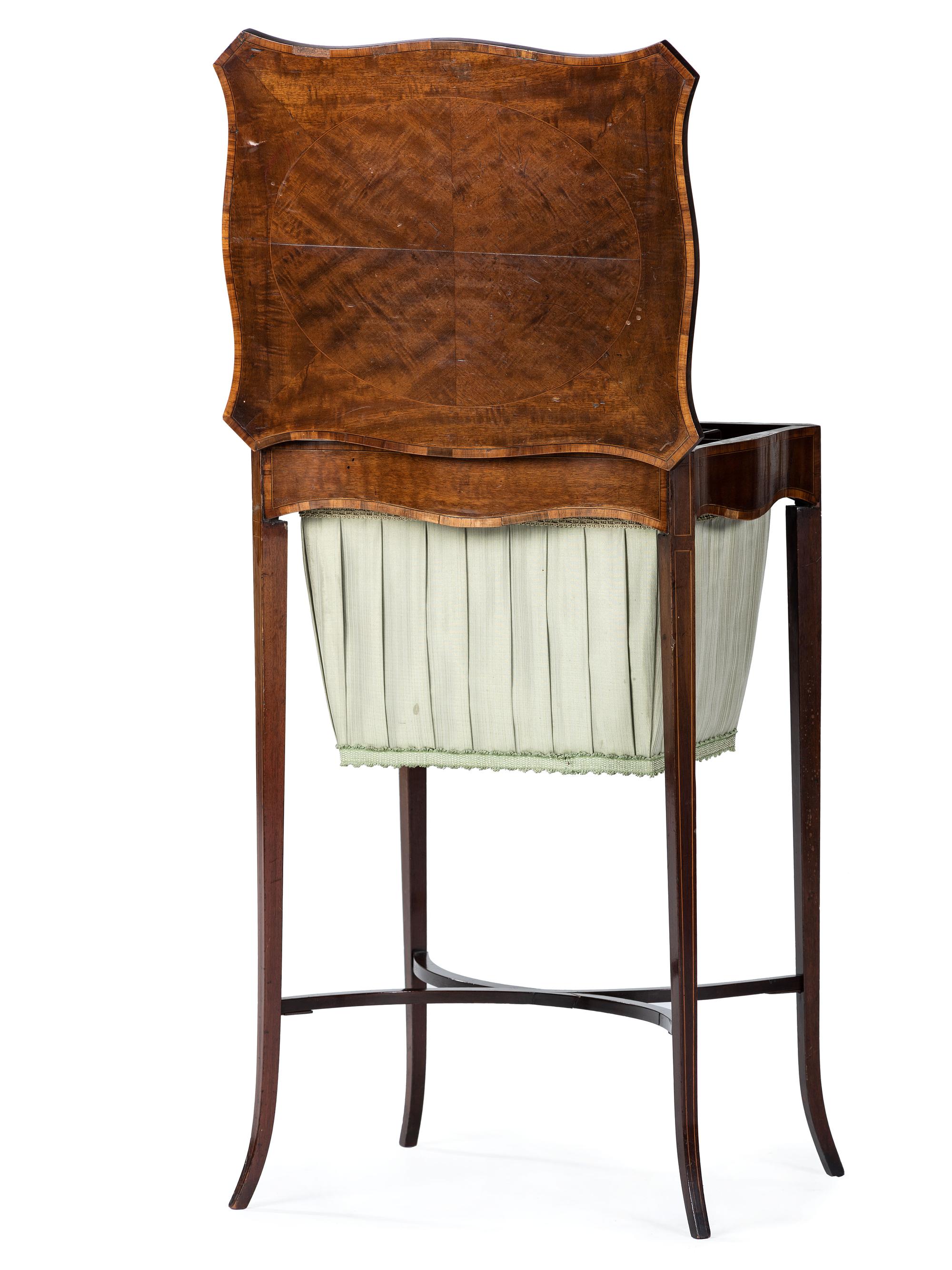 An English Mahogany Sewing Stand with Silk Bag