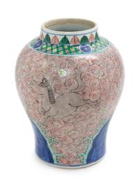 A Wucai Porcelain Jar Height 10 1/2 inches. — 19TH CENTURY
