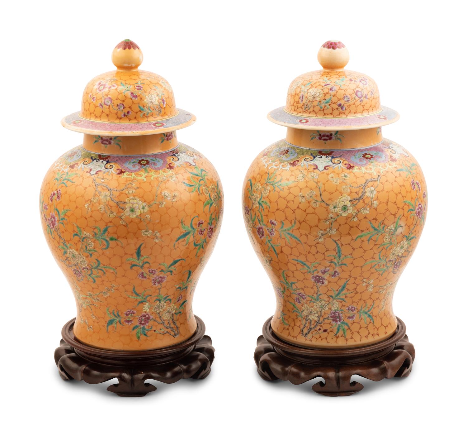 A Pair of Chinese Ochre Ground Famille Rose Porcelain Covered Jars