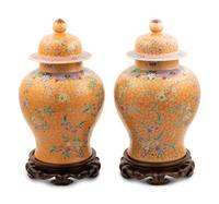 A Pair of Chinese Ochre Ground Famille Rose Porcelain Covered Jars