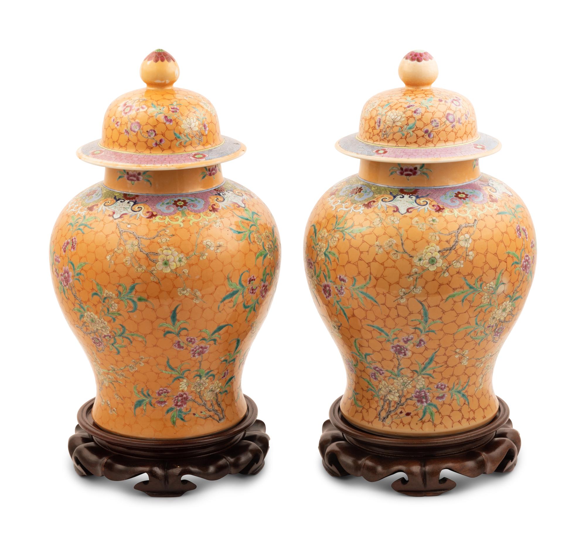 A Pair of Chinese Ochre Ground Famille Rose Porcelain Covered Jars