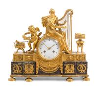 An Empire Gilt Bronze and Marble Figural Mantel Clock