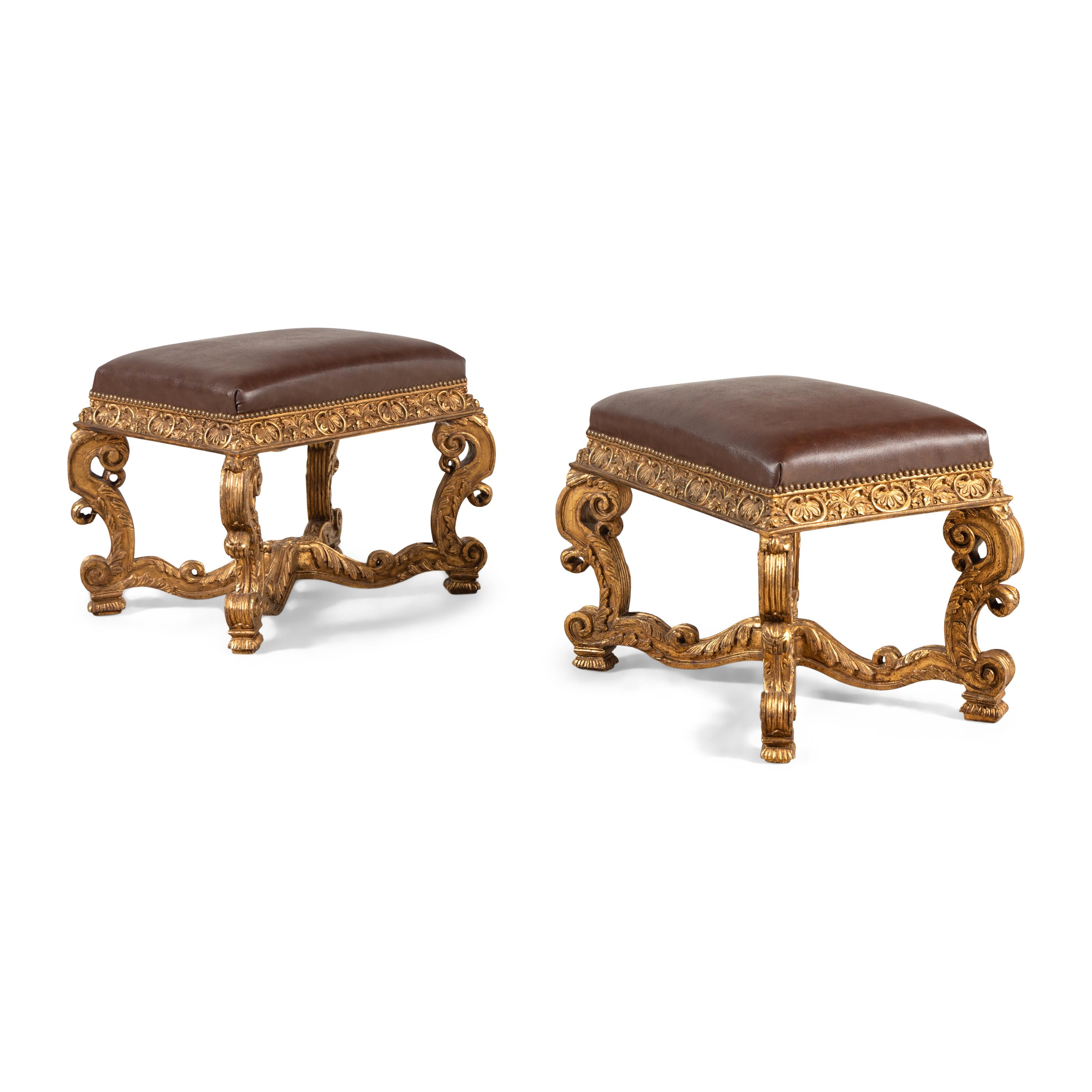 A Pair of Régence Style Giltwood Stools
