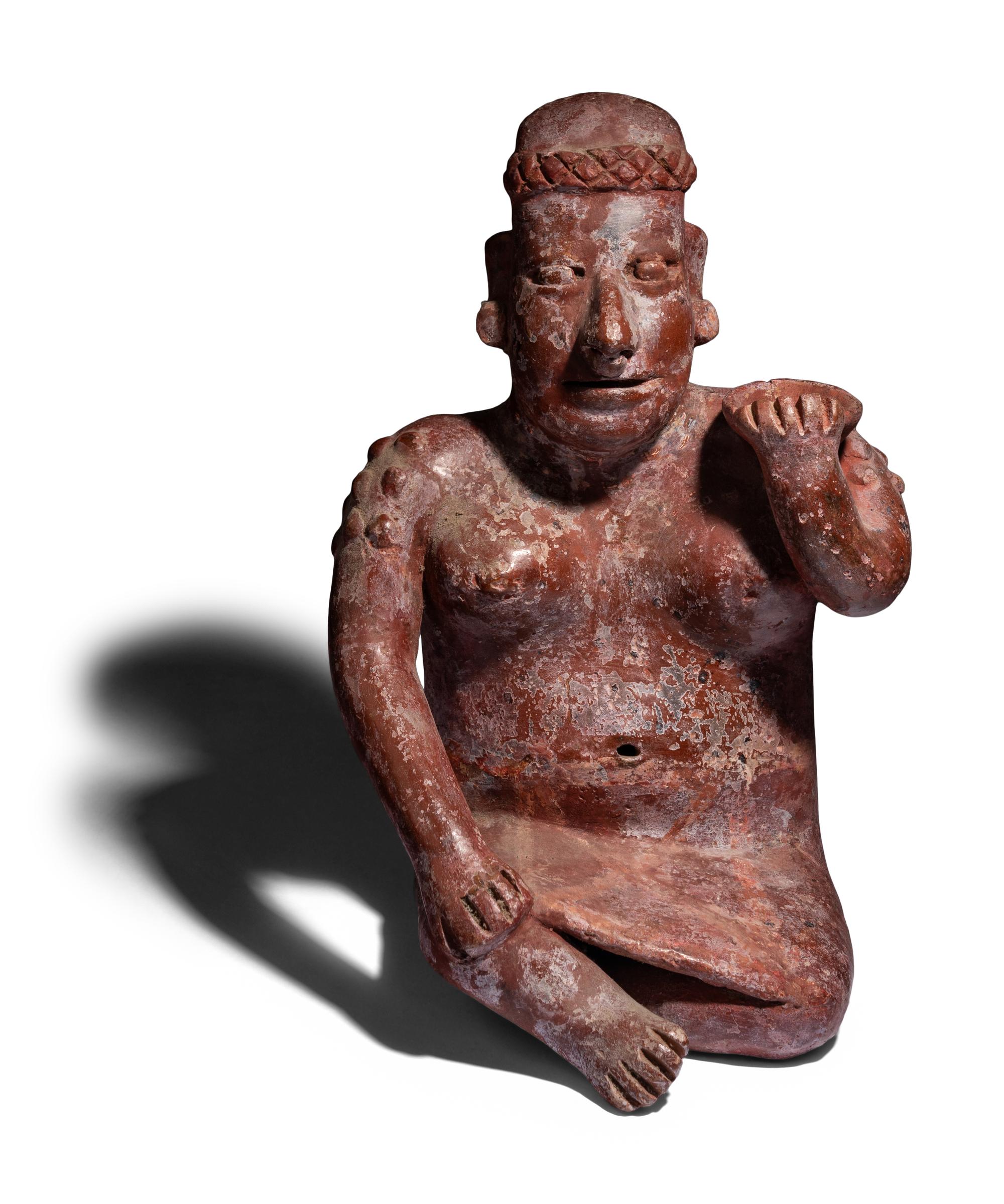 A Colima Seated Figure