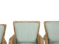 A Set of Four Rattan Armchairs with Seat and Back Cushions
