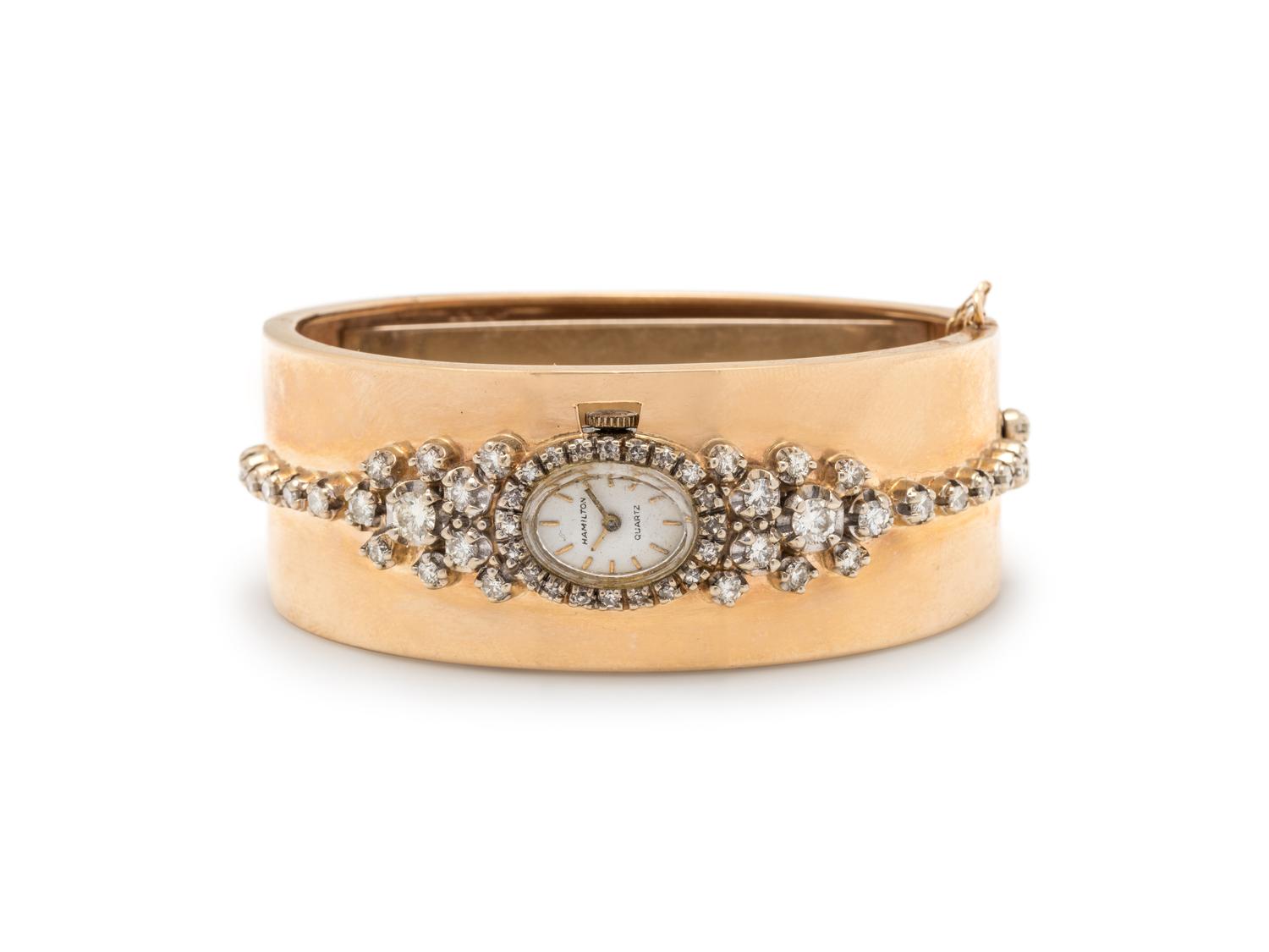 HAMILTON, BICOLOR GOLD AND DIAMOND BANGLE WRISTWATCH