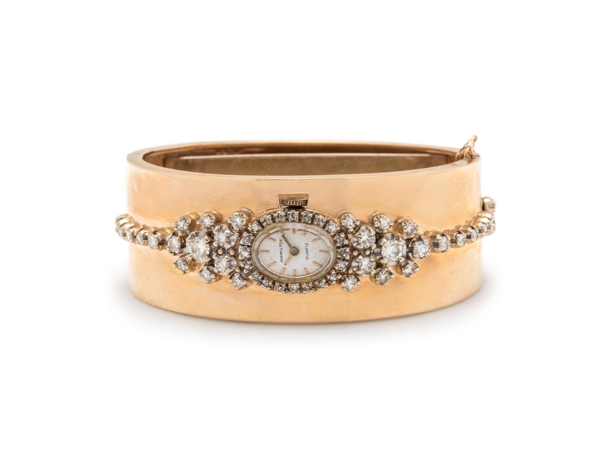 HAMILTON, BICOLOR GOLD AND DIAMOND BANGLE WRISTWATCH