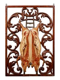 A Continental Carved and Polychrome Decorated Two Sided Butcher's Trade Sign