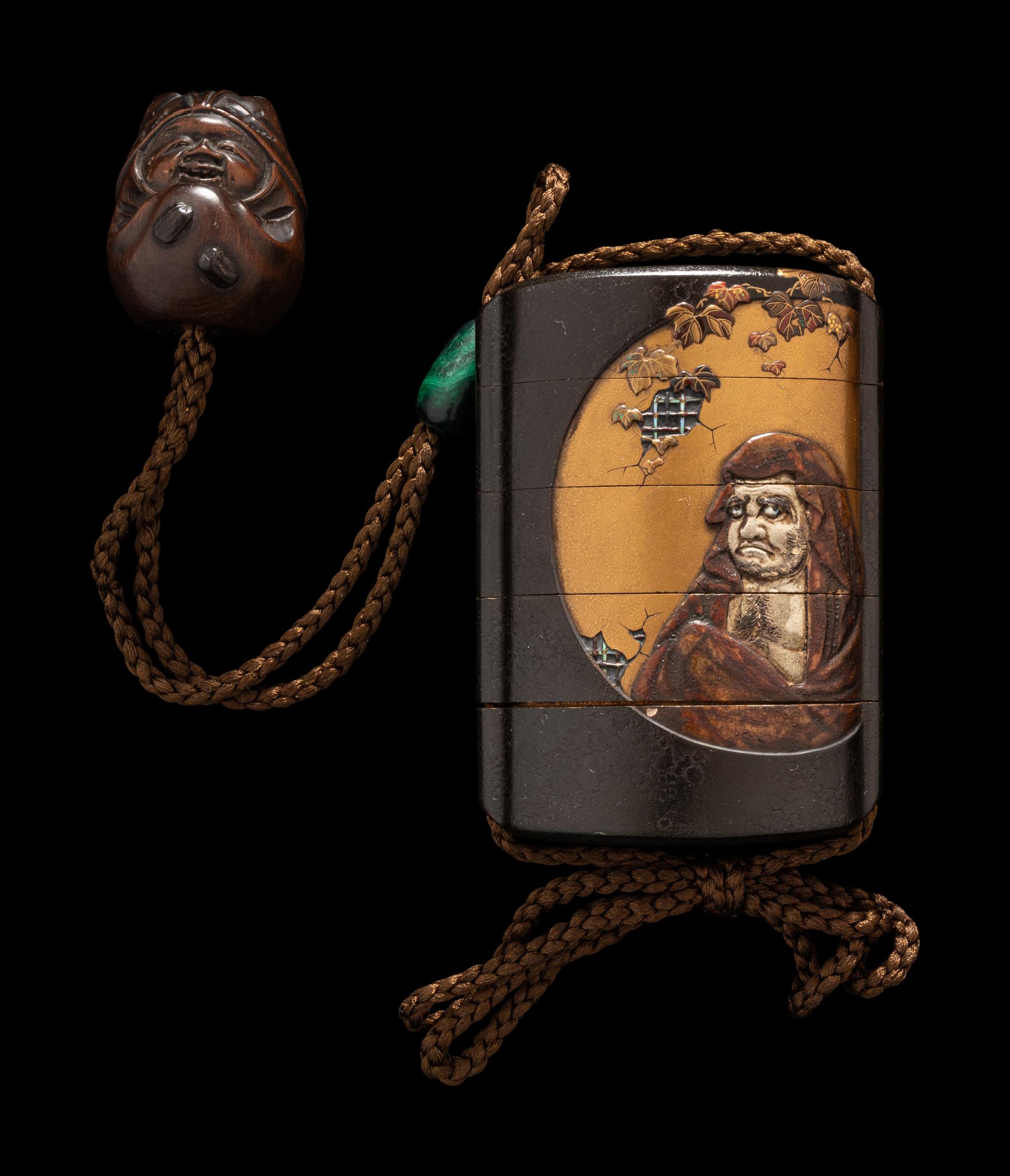 A Japanese Gold and Black Lacquer Four-Case Inro