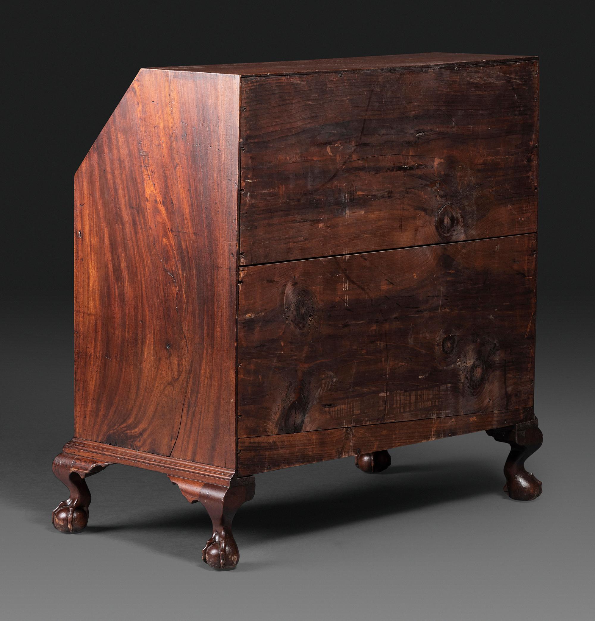 A Chippendale Figured Mahogany Block-Front Claw-and-Ball Foot Slant-Front Desk