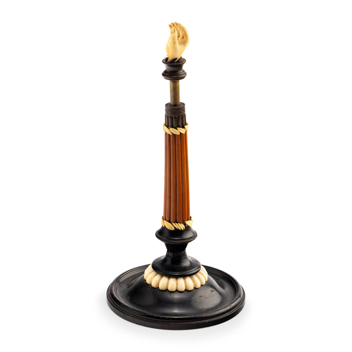 An Austrian Carved and Parcel-Ebonized Columnar Adjustable Quill Stand