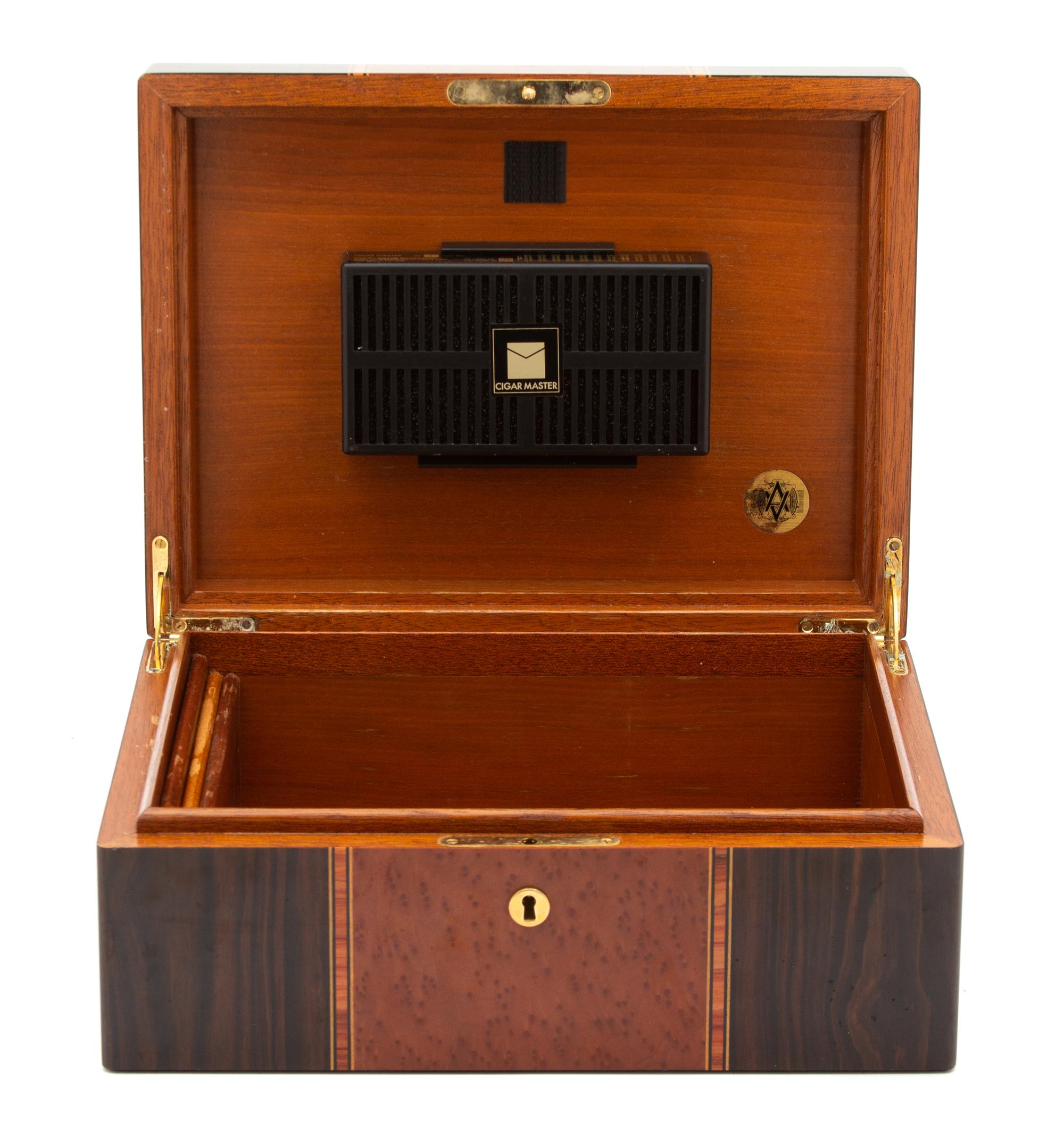 Three Wood Humidors Height of largest 5 1/4 x width 12 1/8 x depth 9 1/8 inches. — 20TH CENTURY