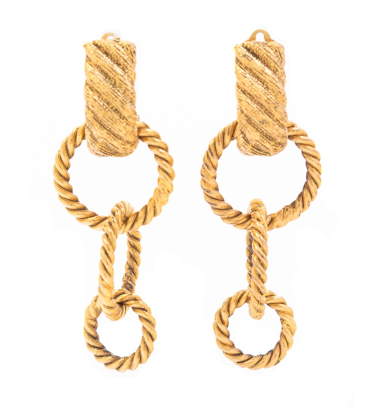 A Pair of Chanel Goldtone Three Ring Earclips, 2.85".