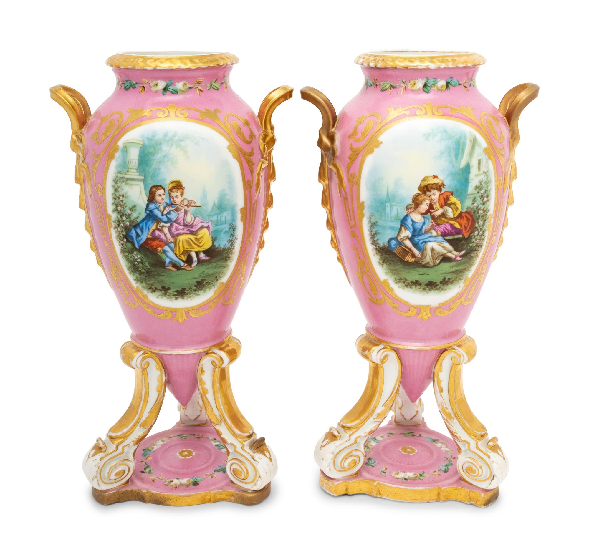 A Pair of Continental Porcelain Tripod Vases