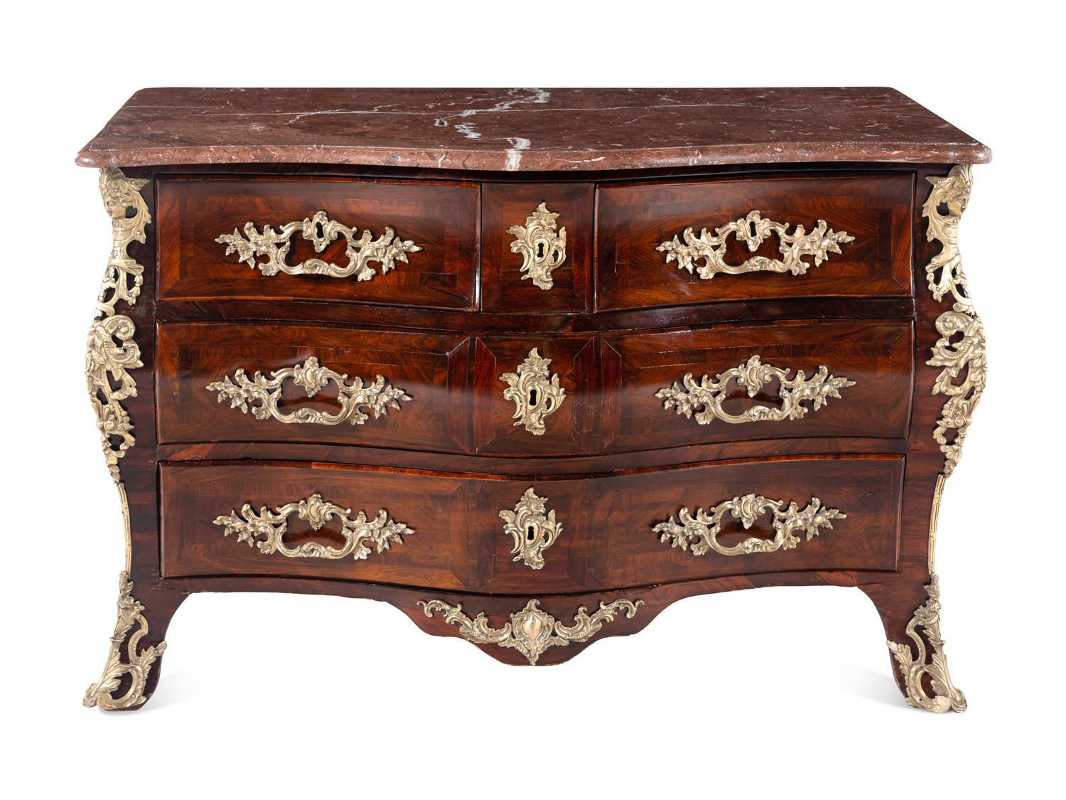 A Régence Style Gilt-Bronze Mounted Kingwood and Tulipwood Commode