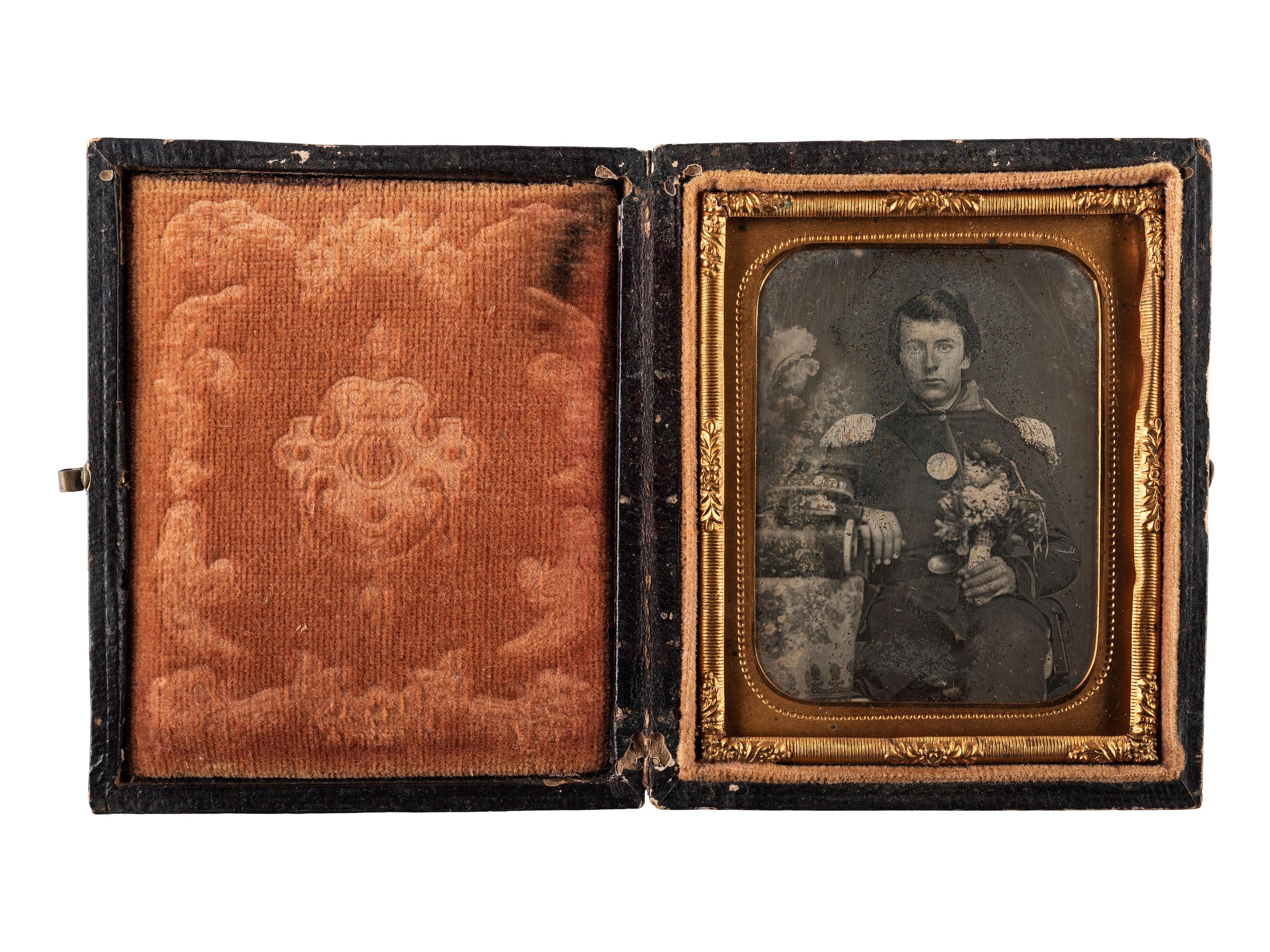 [MILITARIA]. A group of 2 daguerreotypes of militiamen, comprising: