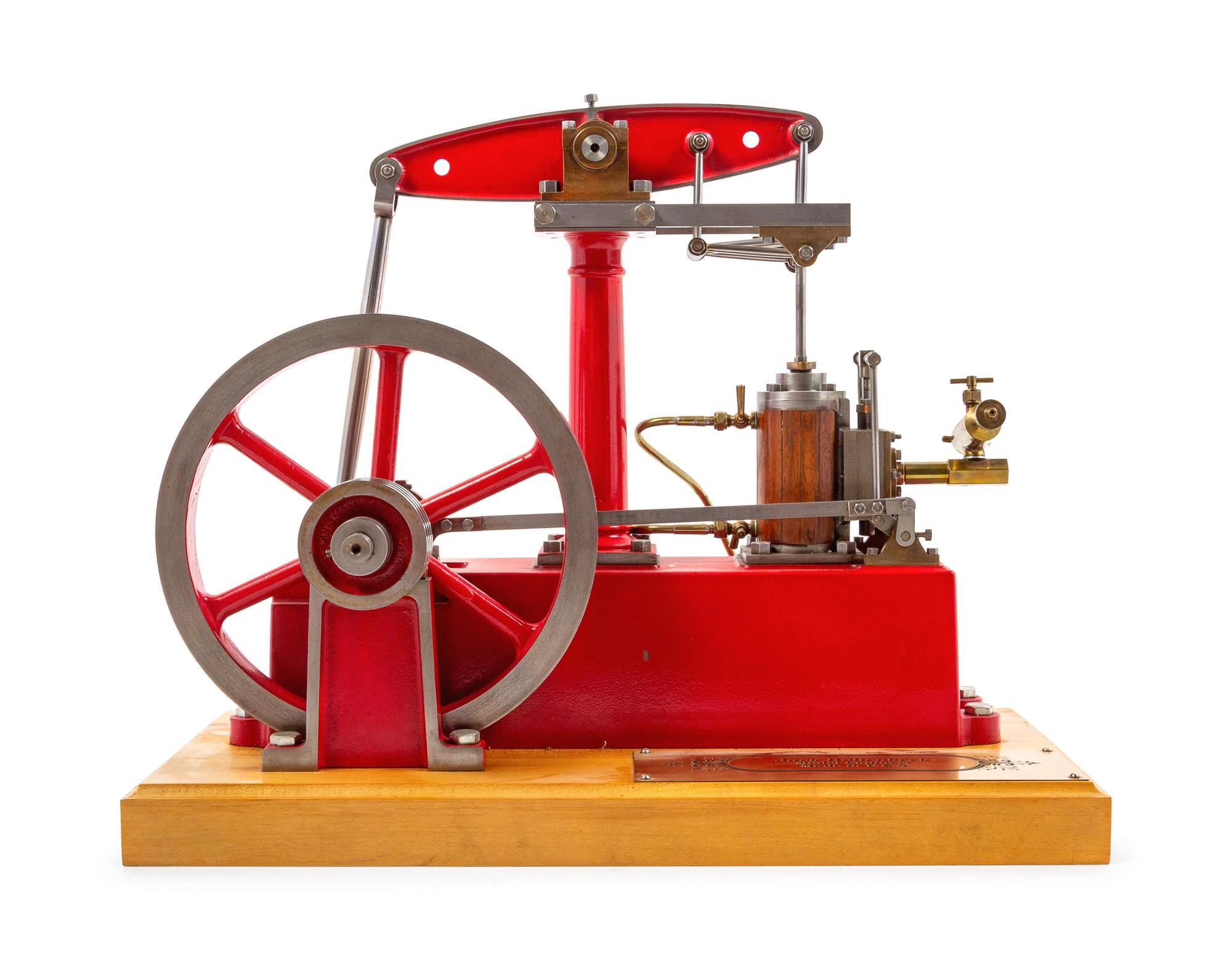 A Painted Metal Single Stroke Engine and Flywheel Scale Model