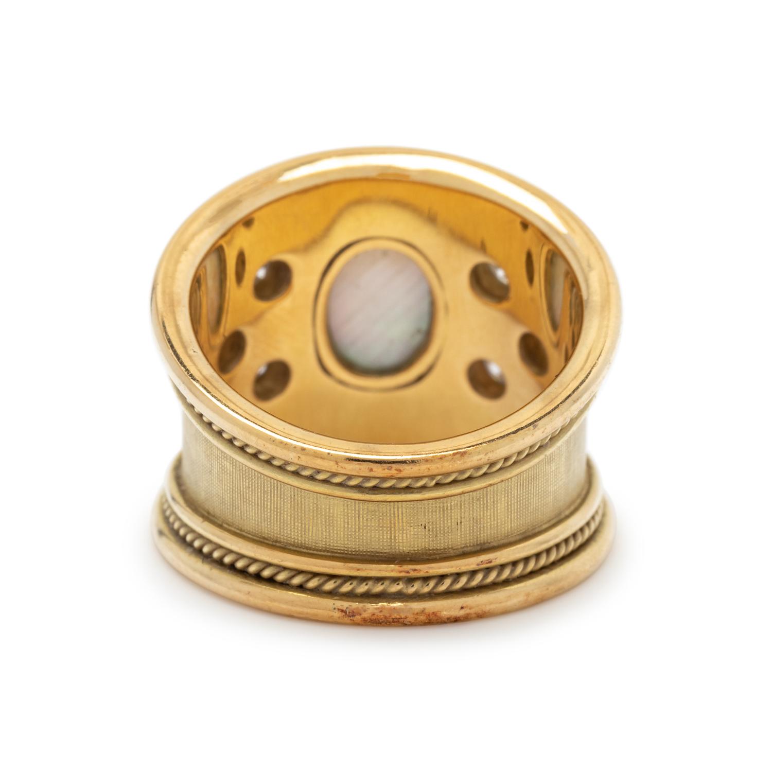 ELIZABETH GAGE, YELLOW GOLD, AQUAMARINE DOUBLET AND DIAMOND RING