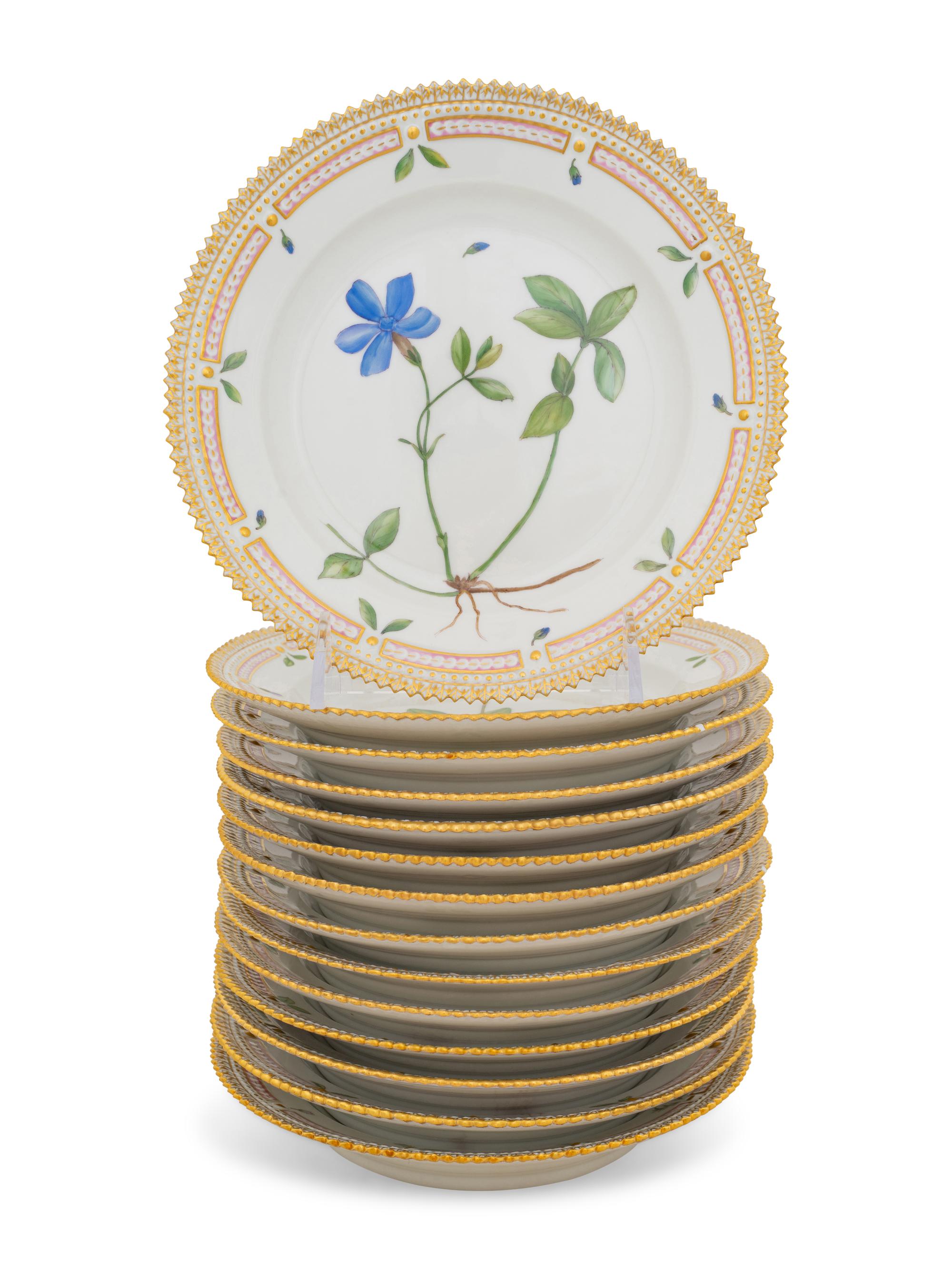 A Set of Fourteen Royal Copenhagen Flora Danica Salad Plates