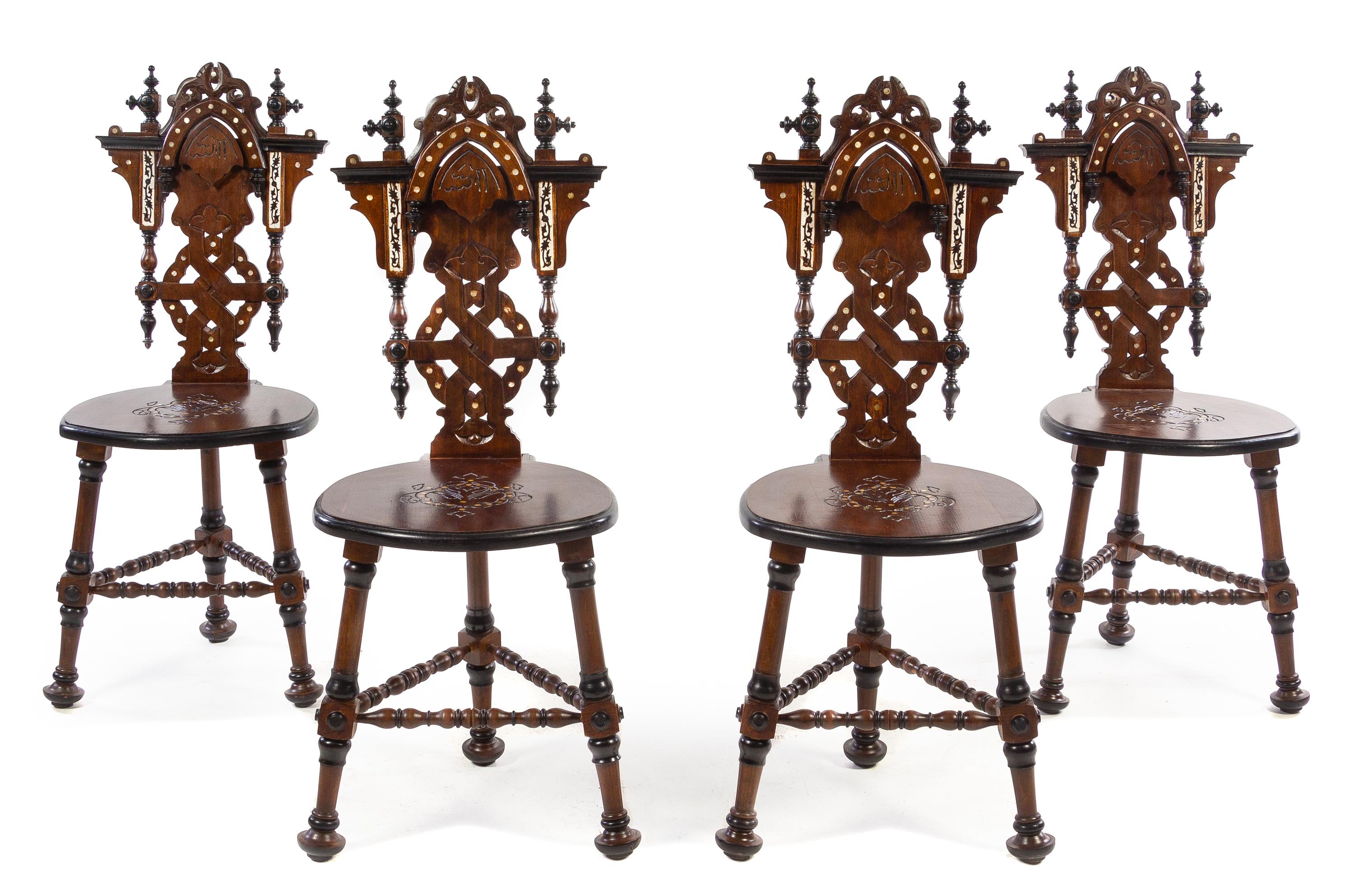 A Set of Four Continental Parcel Ebonized and Mother-of-Pearl Inlaid Walnut Hall Chairs Height 39 1/2 inches. — 20TH CENTURY