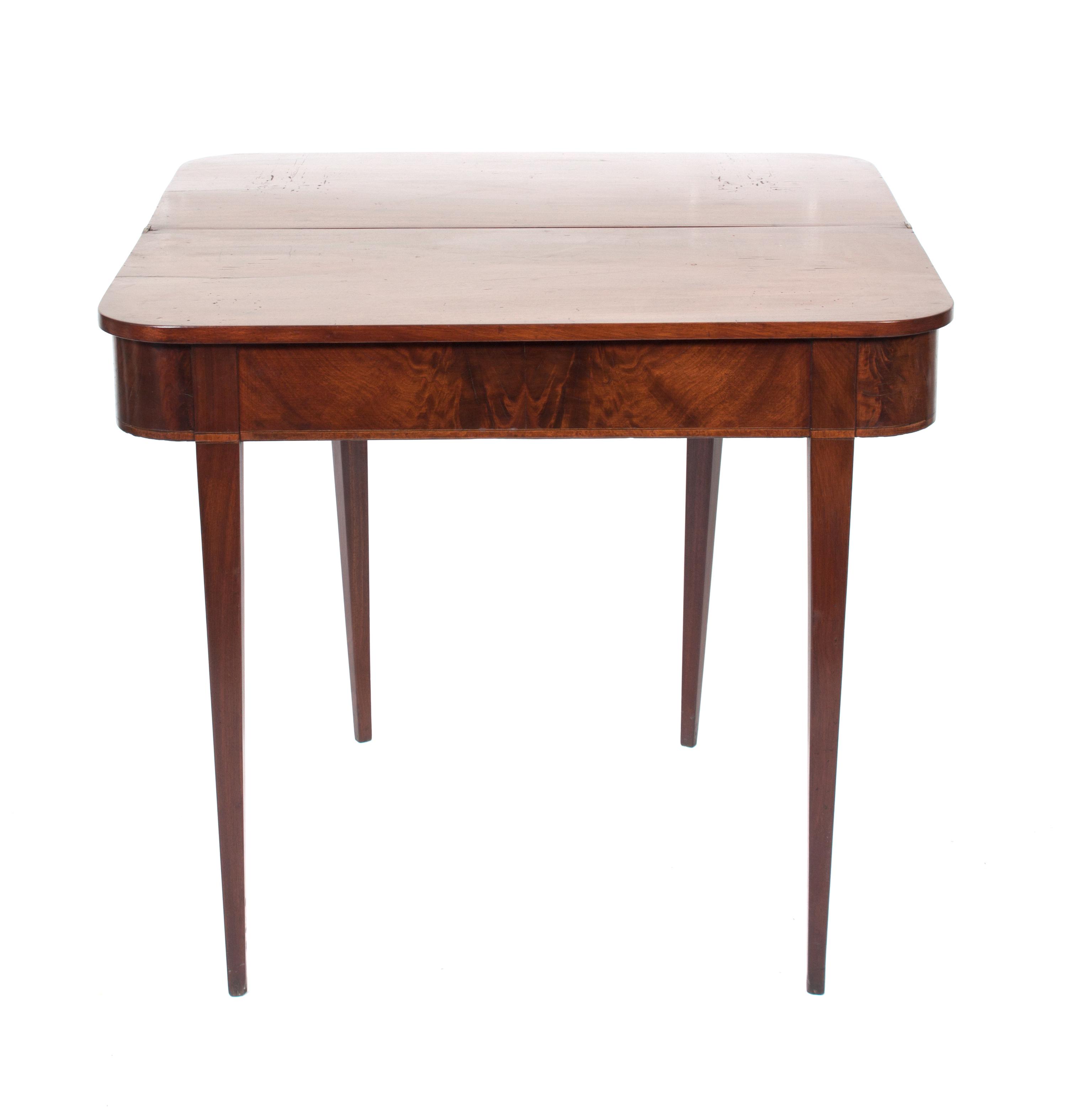 A George III Style Flip-Top Games Table Height 30 1/2 x width 34 1/2 x depth 17 inches (closed).