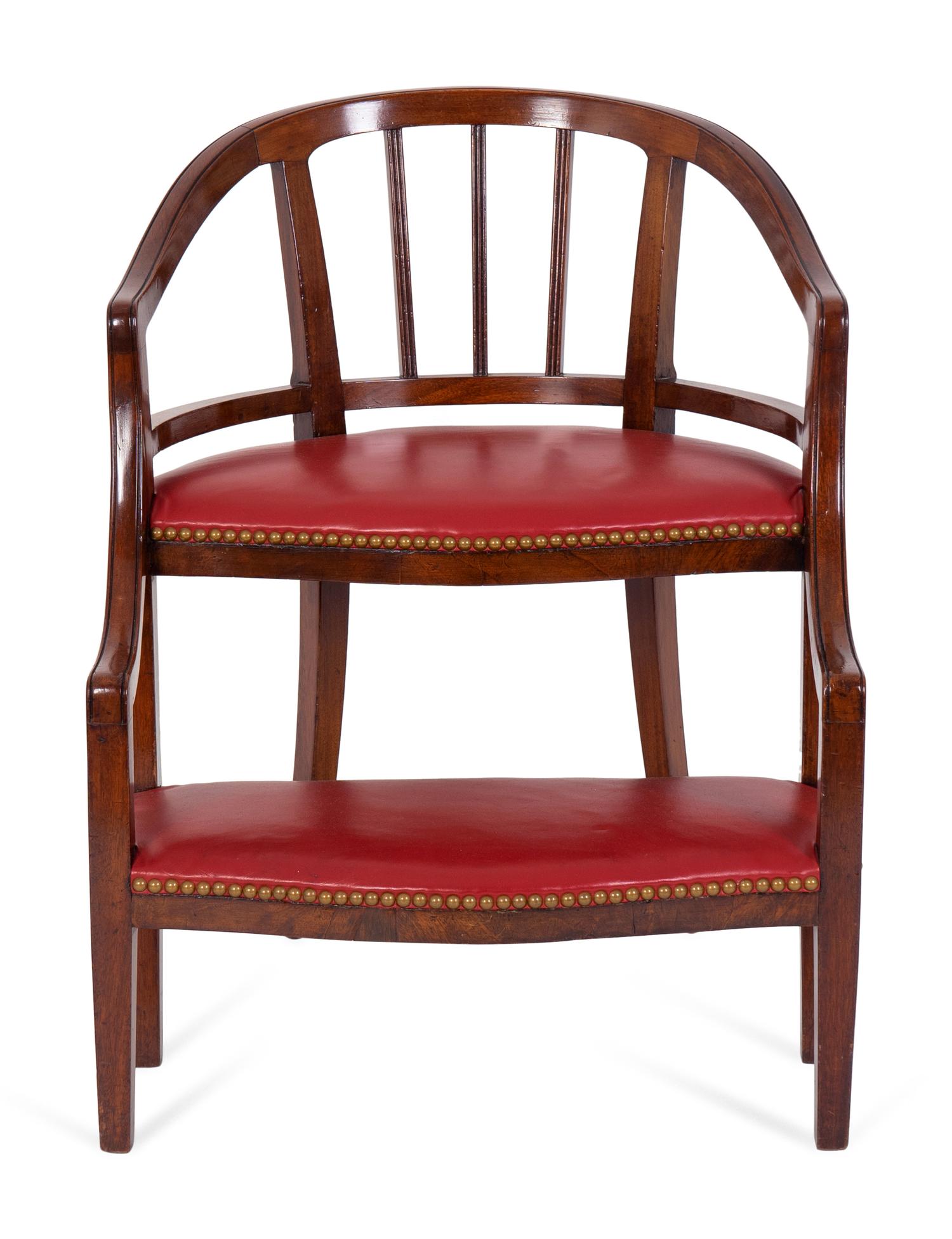 A Georgian Style Mahogany and Red Leatherette Library Chair — 20TH CENTURY