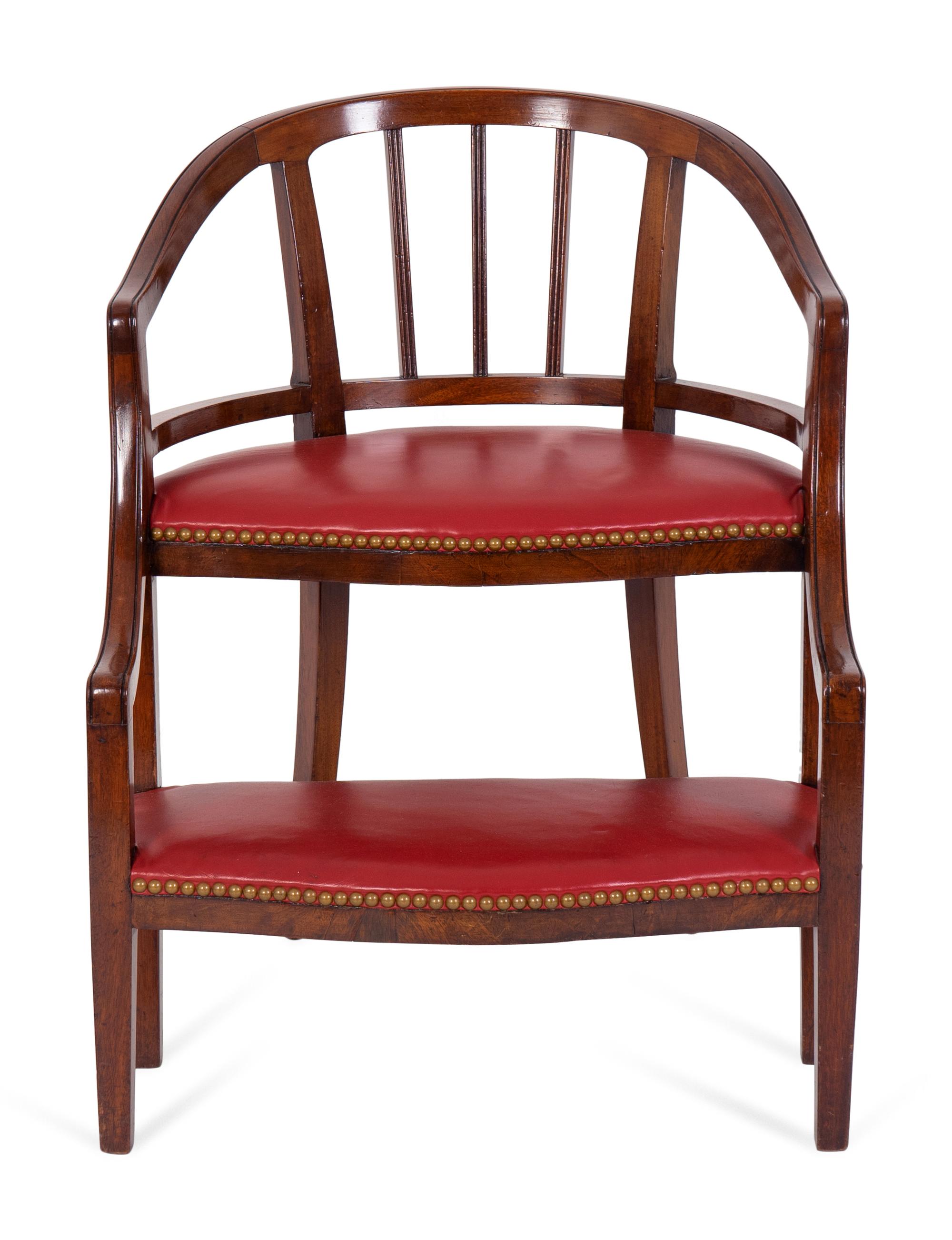 A Georgian Style Mahogany and Red Leatherette Library Chair — 20TH CENTURY