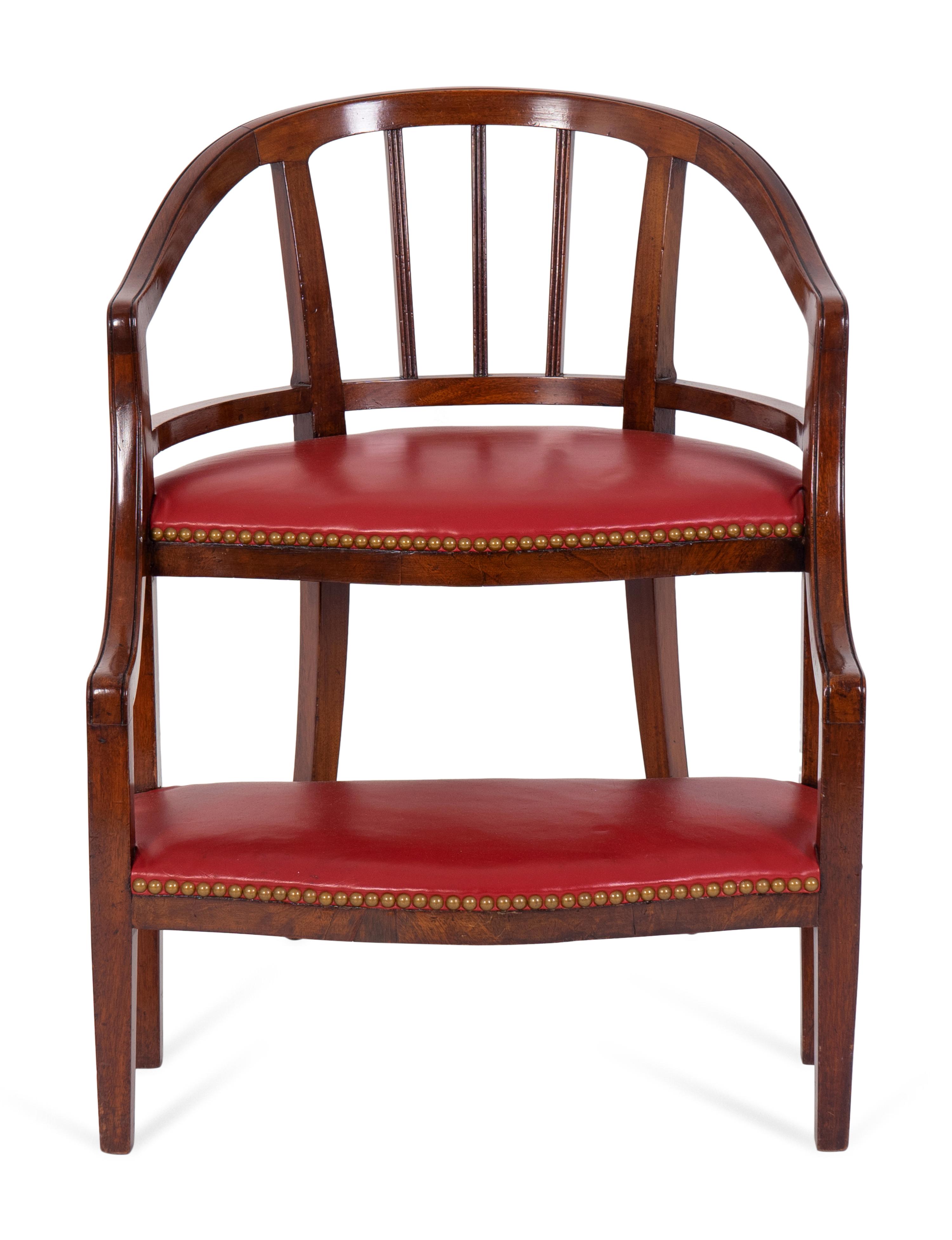 A Georgian Style Mahogany and Red Leatherette Library Chair — 20TH CENTURY