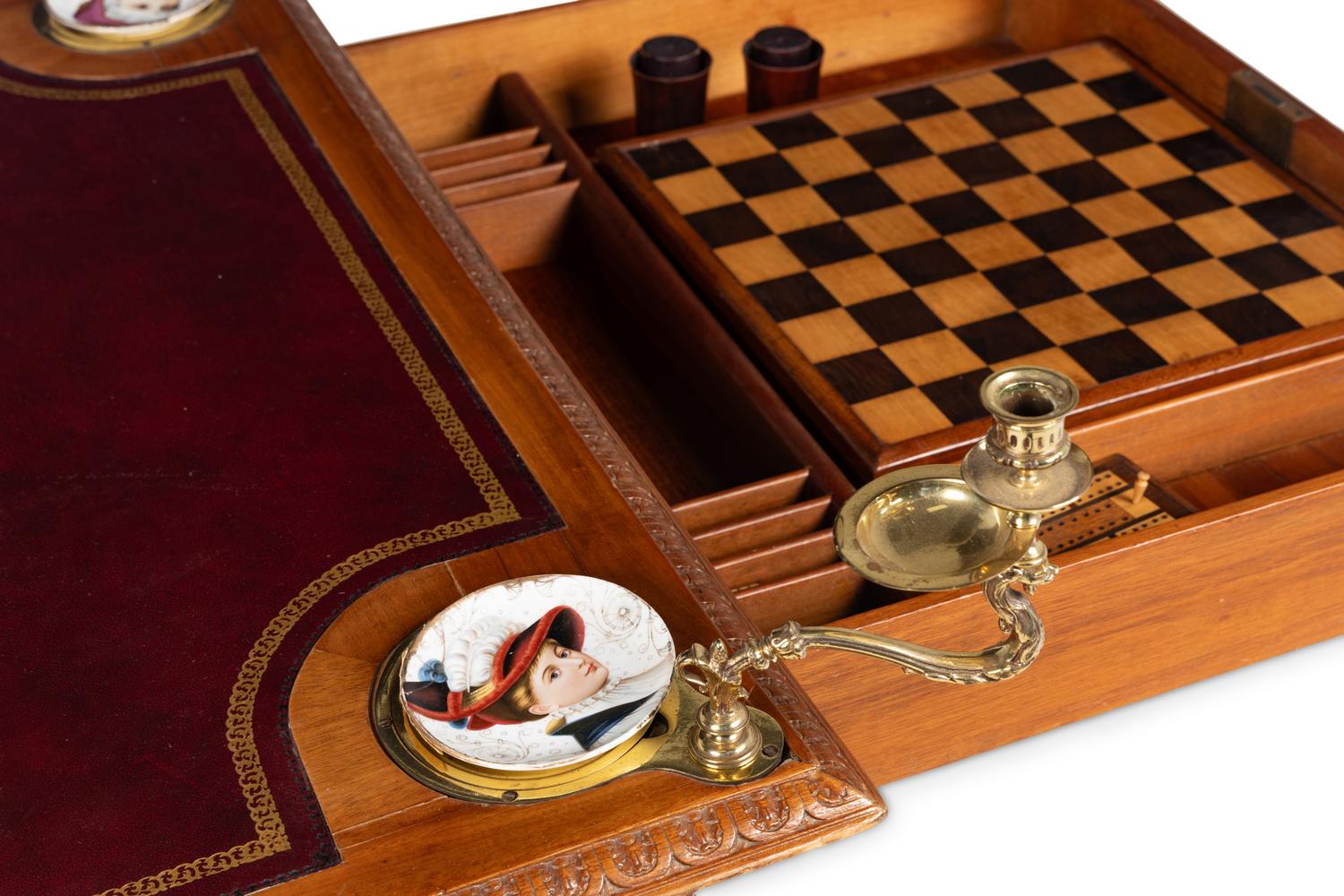 An Edwardian Oak Game Table