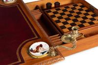 An Edwardian Oak Game Table
