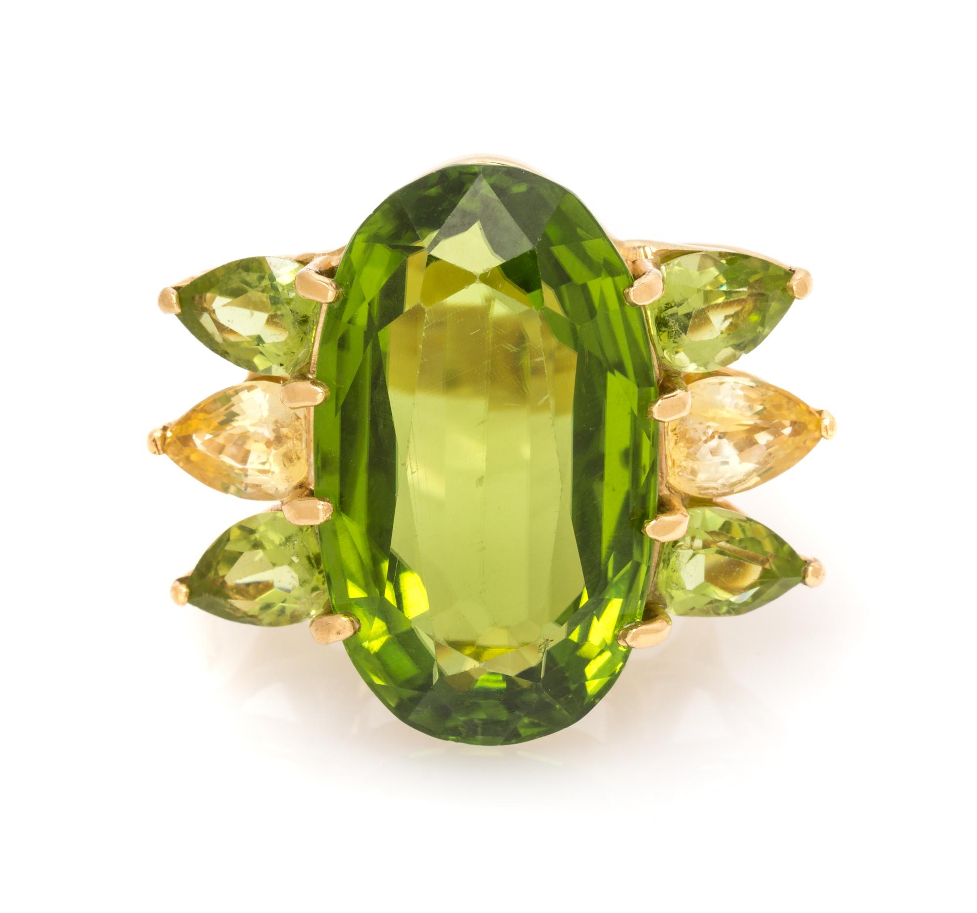 An 18 Karat Yellow Gold, Peridot and Lemon Quartz Ring, 10.60 dwts.