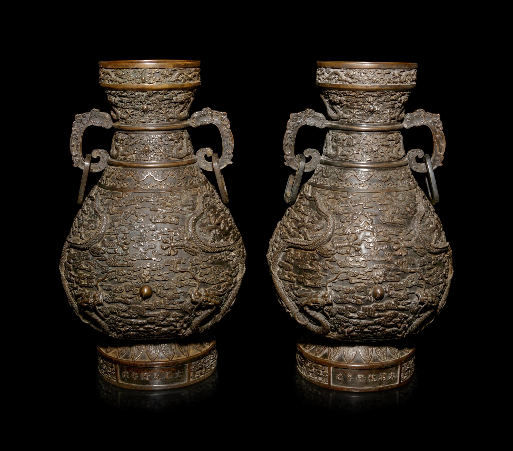 A Pair of Bronze Baluster Vases