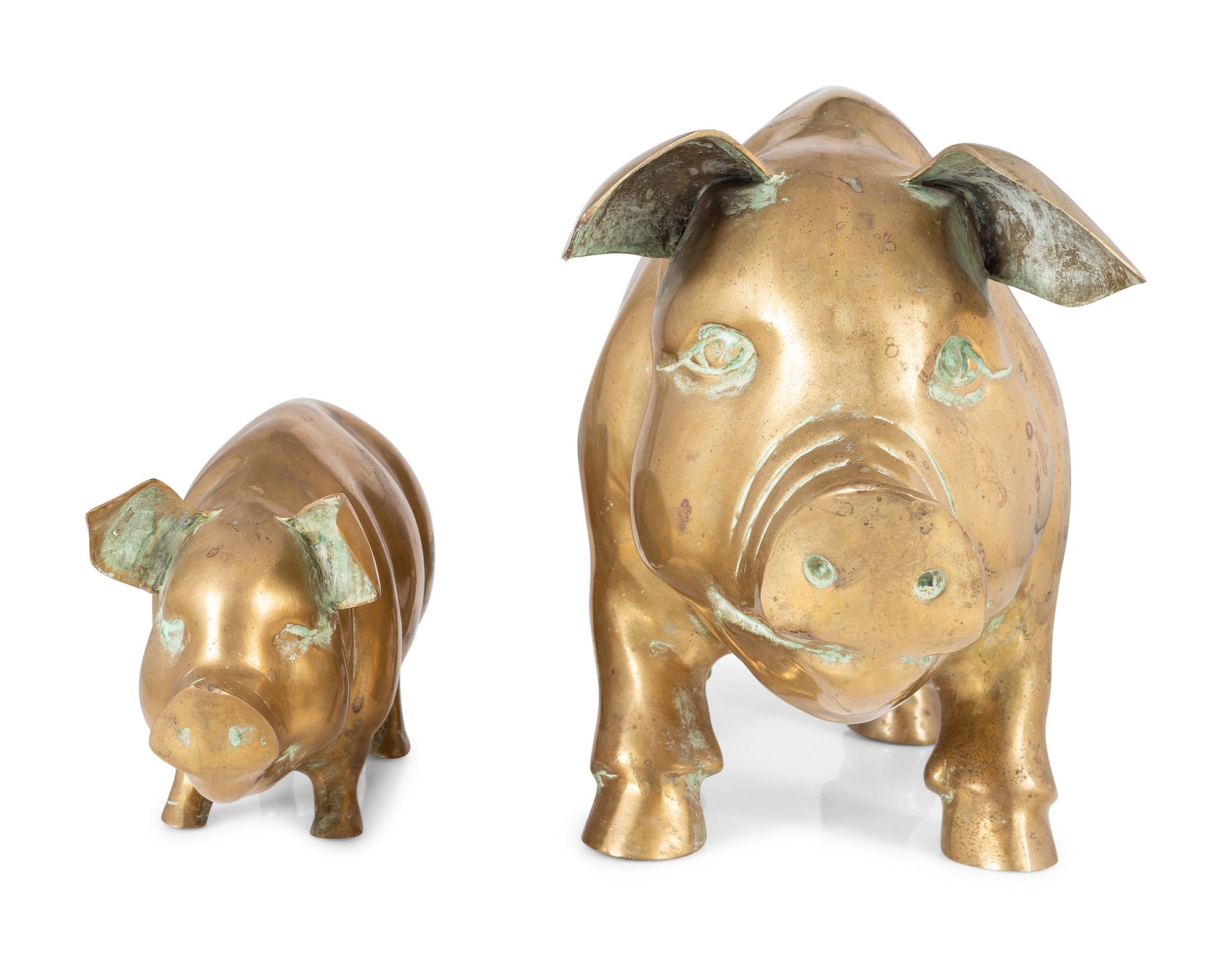 Two Brass Pig Sculptures