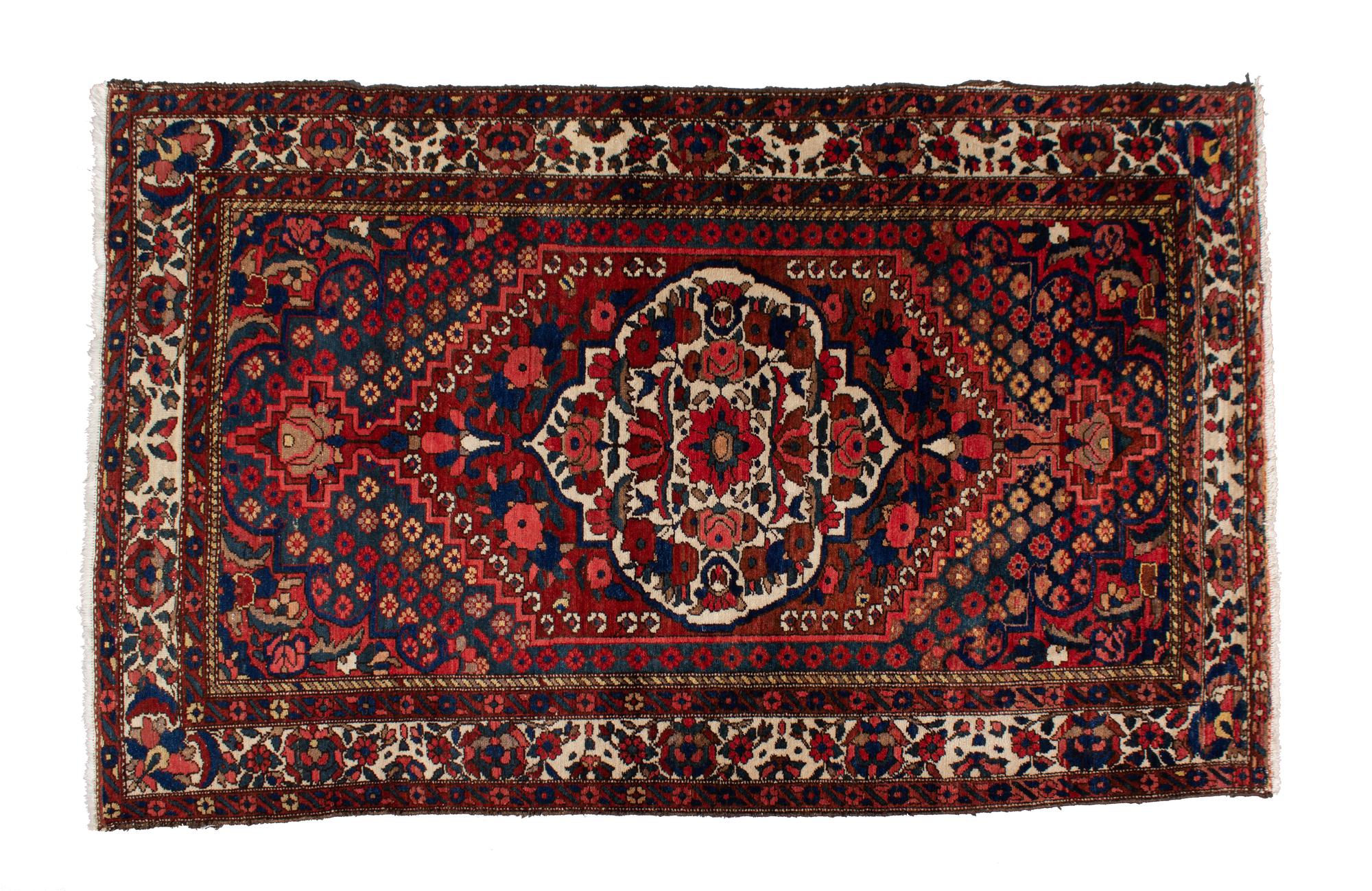 A Pakistani Persian Design Wool Rug 7 feet 6 inches x 4 feet 8 inches. — 20TH CENTURY
