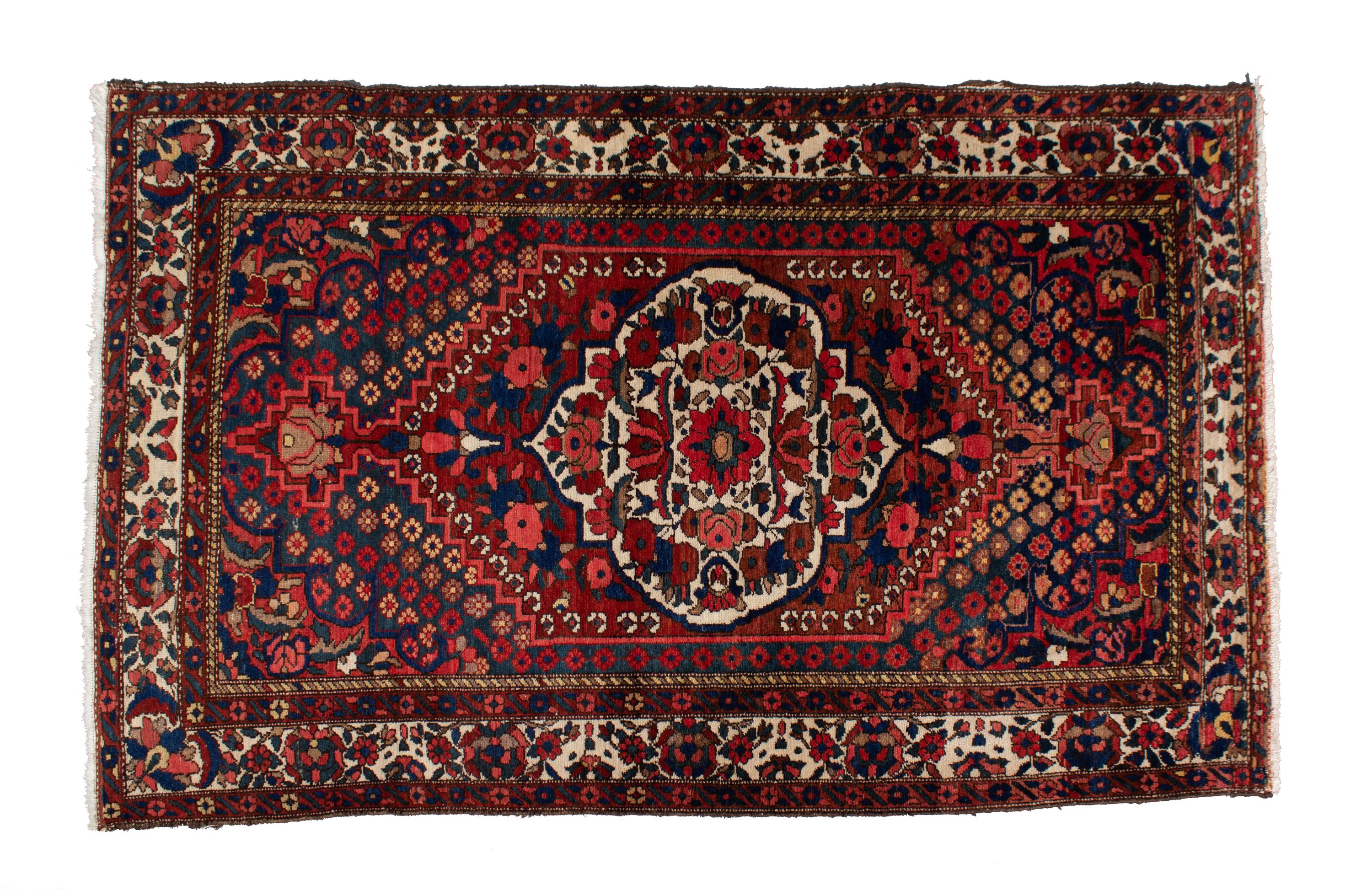A Pakistani Persian Design Wool Rug 7 feet 6 inches x 4 feet 8 inches. — 20TH CENTURY