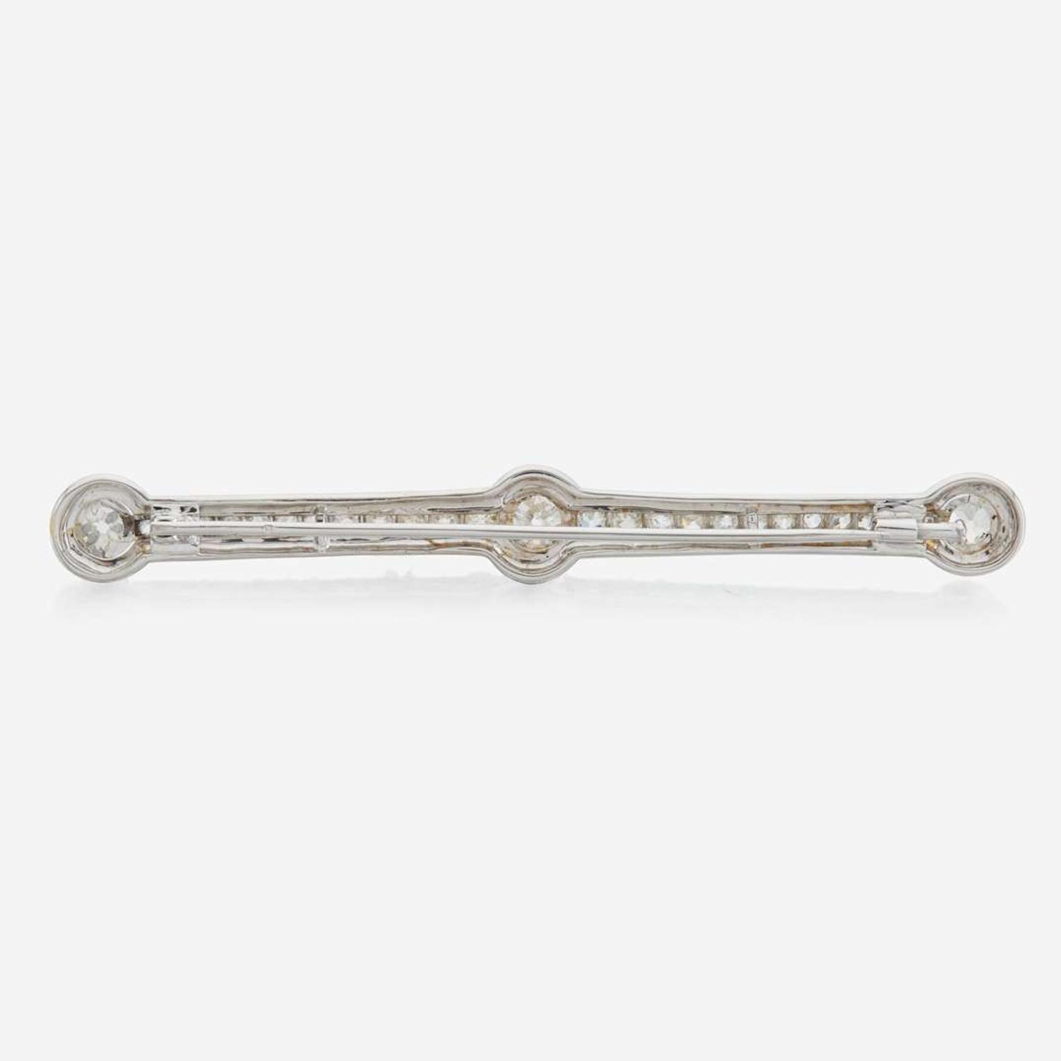 A diamond and white gold brooch