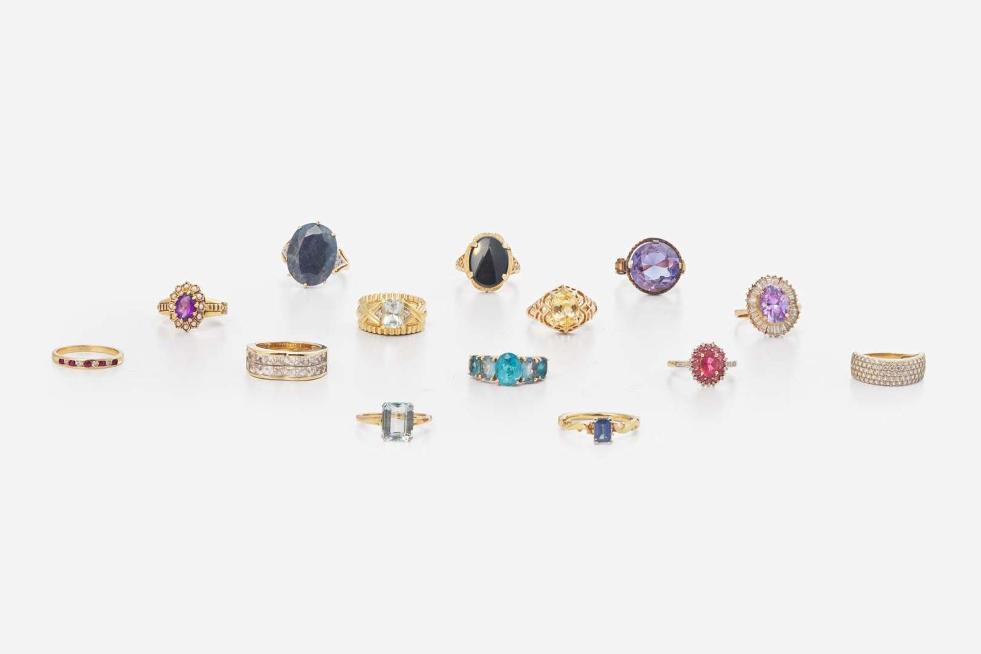 A Collection of Assorted Gold and Gemstone Rings