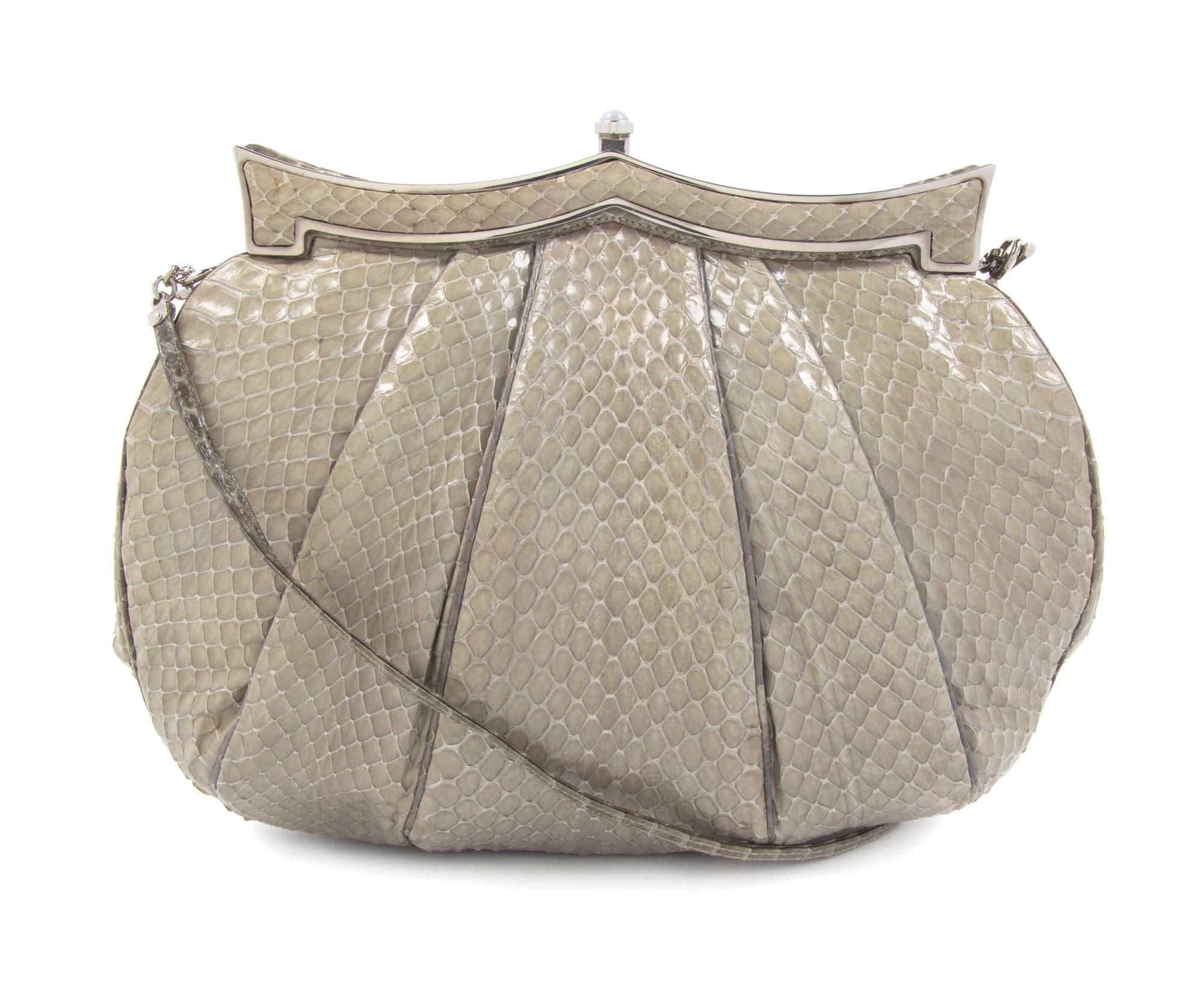 A Judith Leiber Sage Karung Snakeskin Bag, 9 1/2 x 8 x 1 inches.