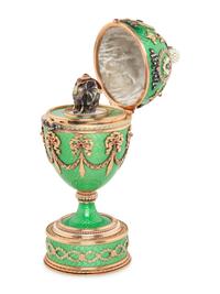 A Gold, Guilloché Enamel and Gemstone-Mounted Surprise Egg
