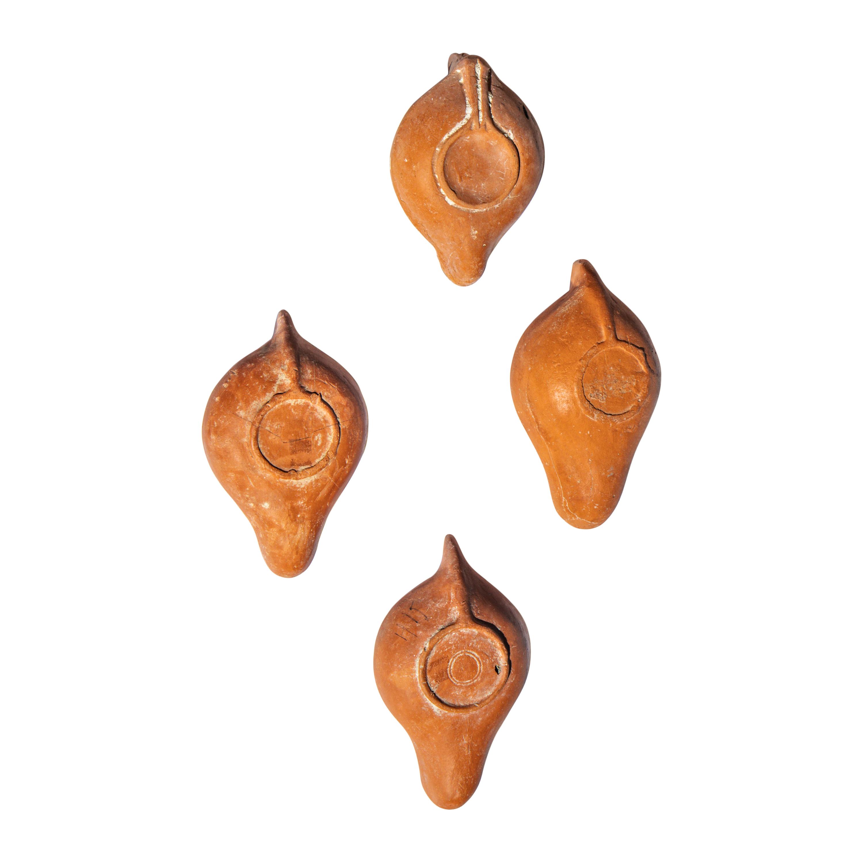 Four Roman Terracotta Lamps