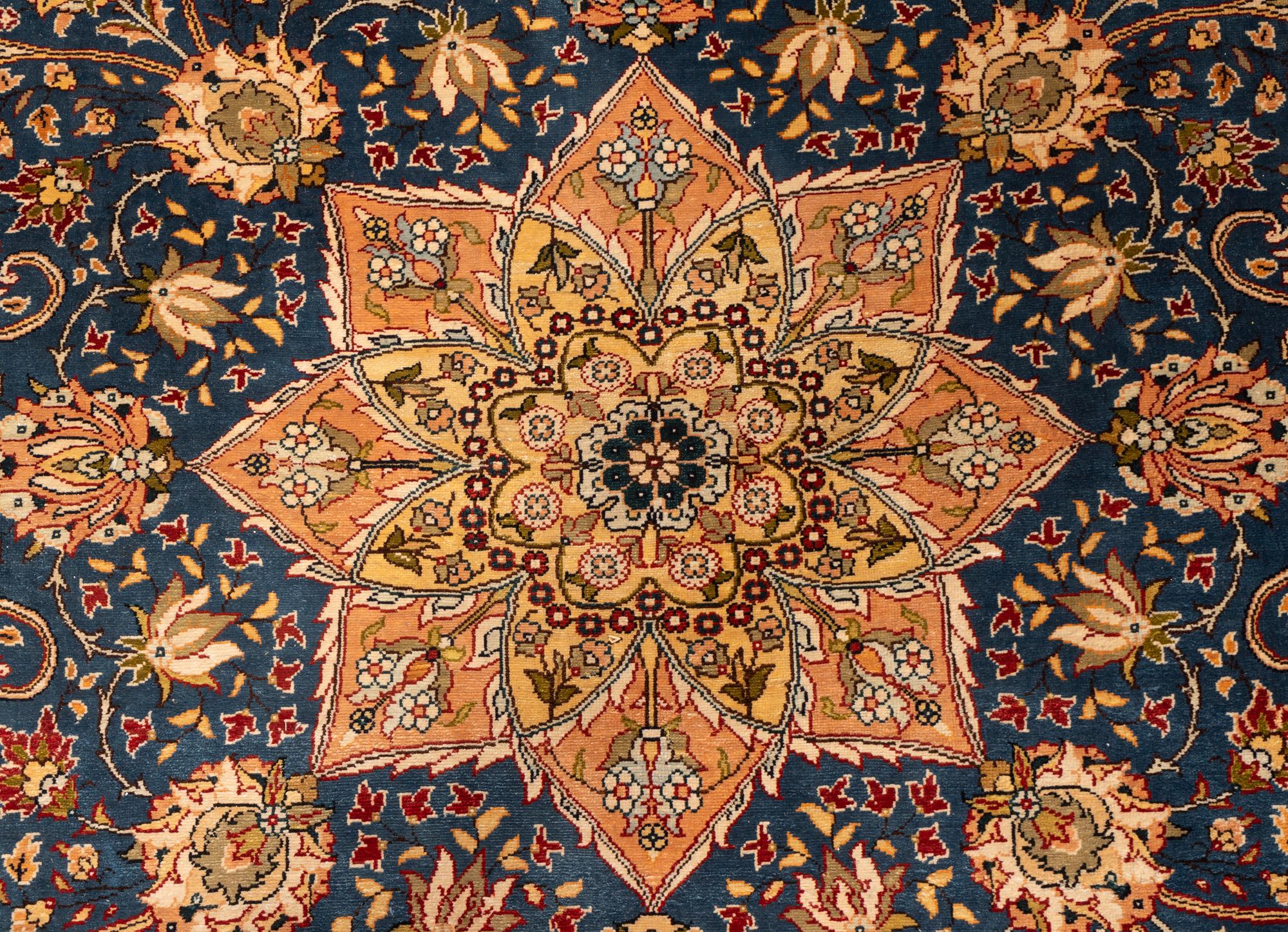 A Sino-Heriz Silk Carpet