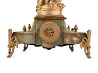 A Neoclassical Gilt Metal and Onyx Clock Garniture