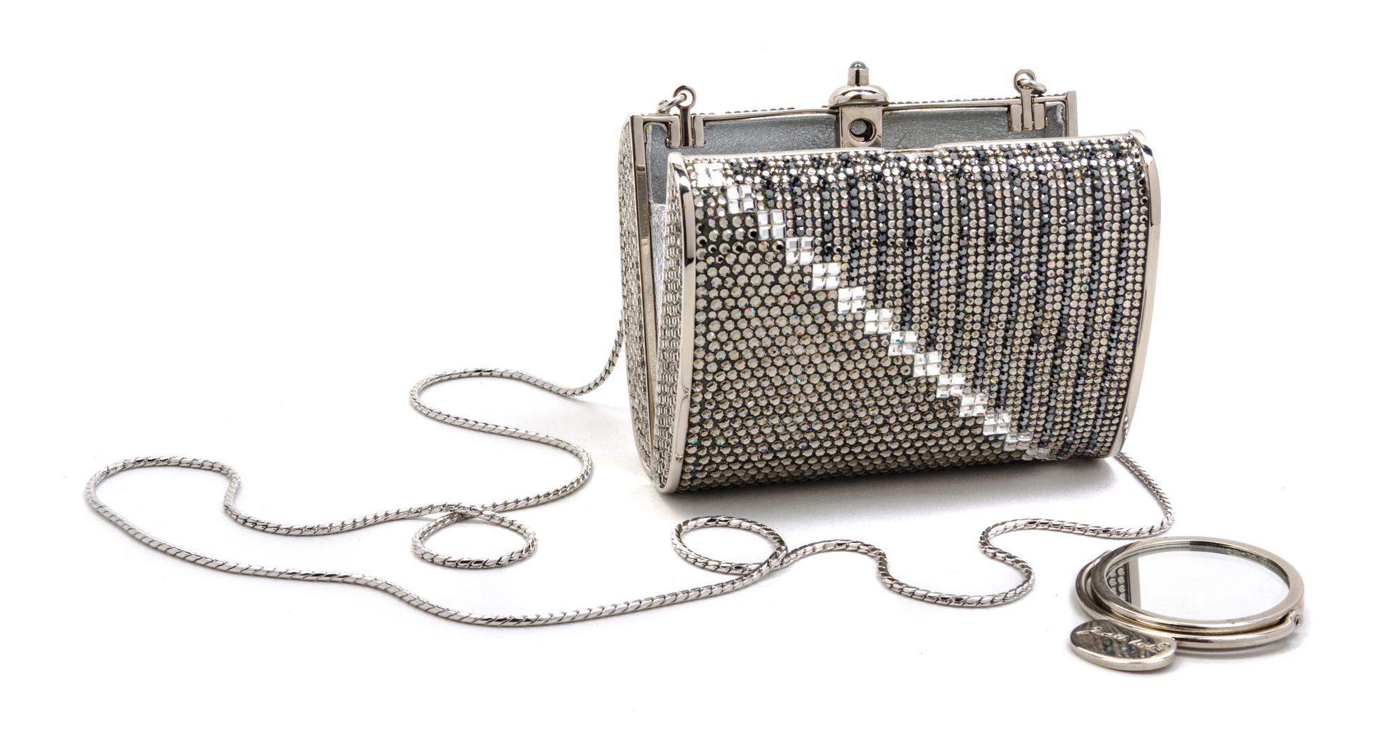 A Judith Leiber Grey Swarovski Crystal Minaudiere, 4 x 3 x 1 inches.